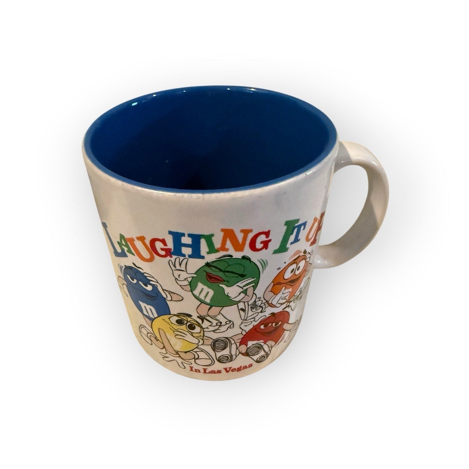 Laughing it up in Las Vegas M&M coffee cup