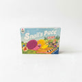 The image is a boxed game called "Snail's Pace Race" with colorful illustrations of snails and a checkered flag.
