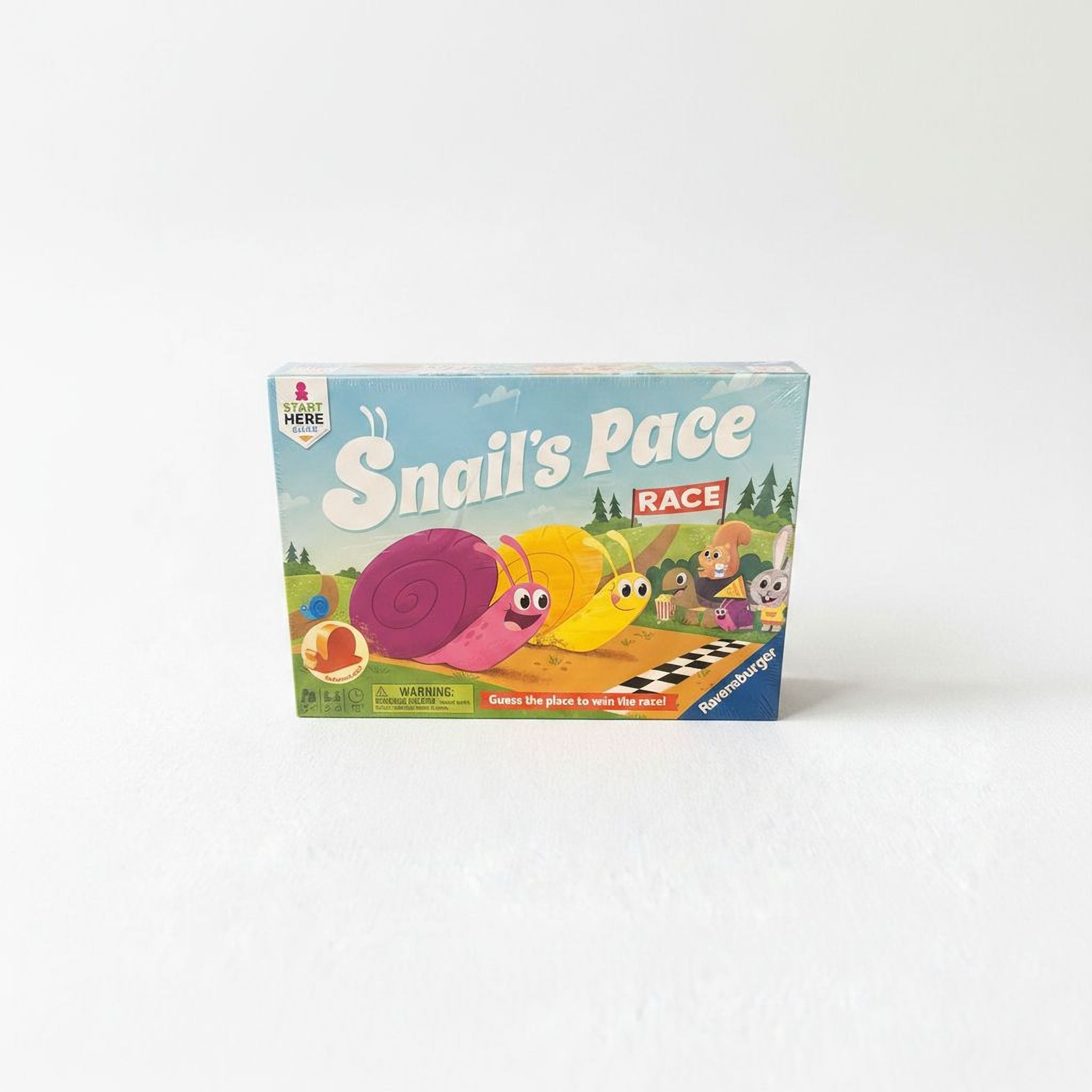 The image is a boxed game called "Snail's Pace Race" with colorful illustrations of snails and a checkered flag.